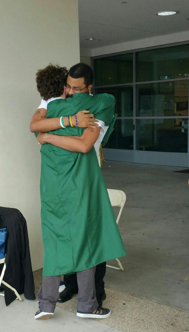 This father, who is suffering from brain tumours, hugging his son at his graduation after being told he would not be able to make it.