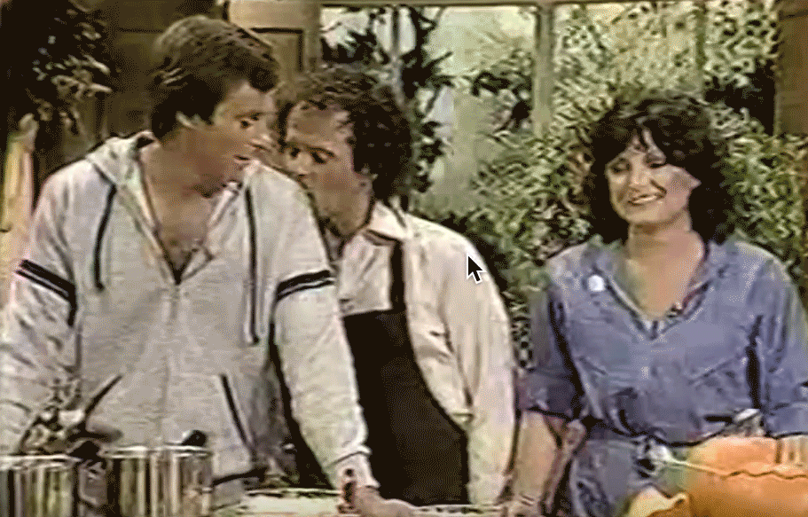 Simmons kisses Tristan Rogers and his wife on an episode of The Richard Simmons Show.