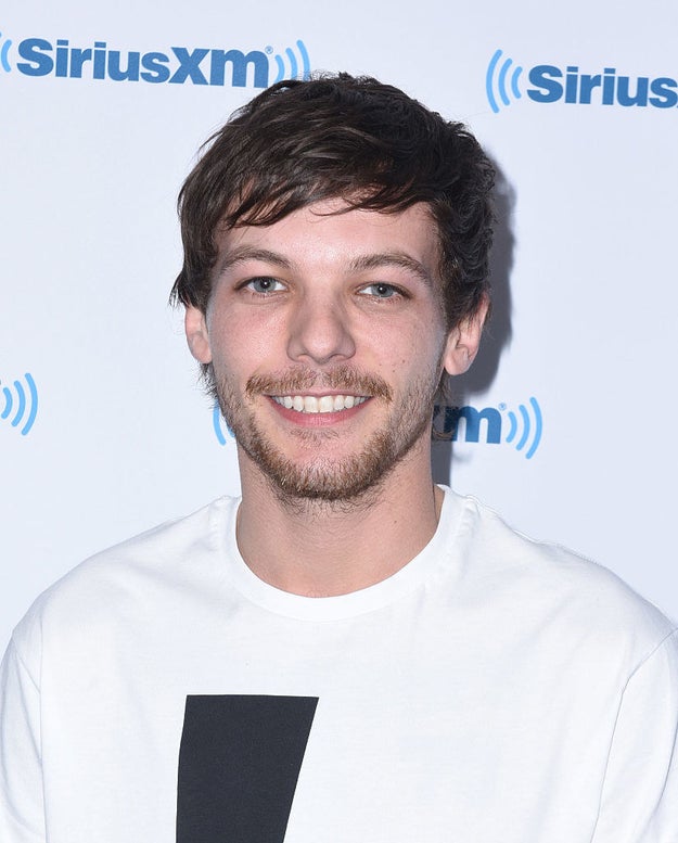 Singer Louis Tomlinson of One Direction was arrested Saturday morning at Los Angeles International Airport following an altercation with paparazzi.