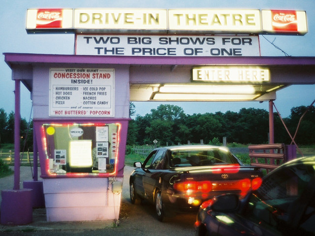 We can catch a double feature and get eaten by mosquitos like real men