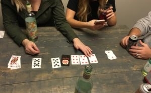 This is essentially the drinking game version of Blackjack. You must guess the suite of the card that is going to be flipped. If you choose correctly the dealer must drink, but if you get it wrong you must drink.