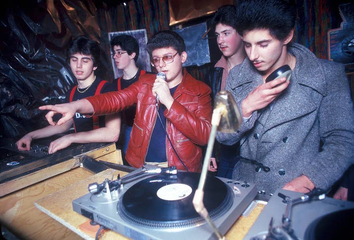 A group of DJs spin records at a disco club in New York City, 1979.