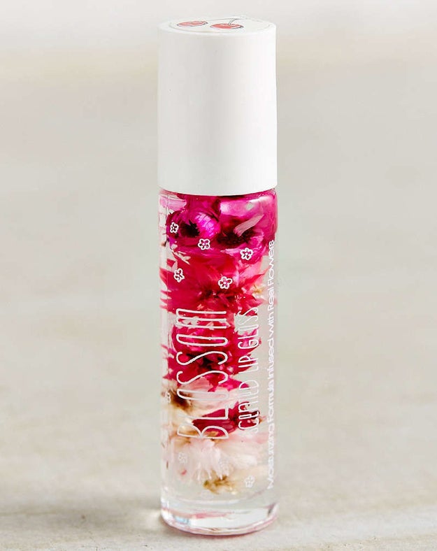A delicious-smelling lip gloss infused with real dried flowers and mineral oil to leave your pout soft and shiny.