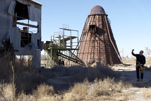 While scouting filming locations in New Mexico, Audouy came across an abandoned lumber mill, and was struck by the beehive burner on site (below).