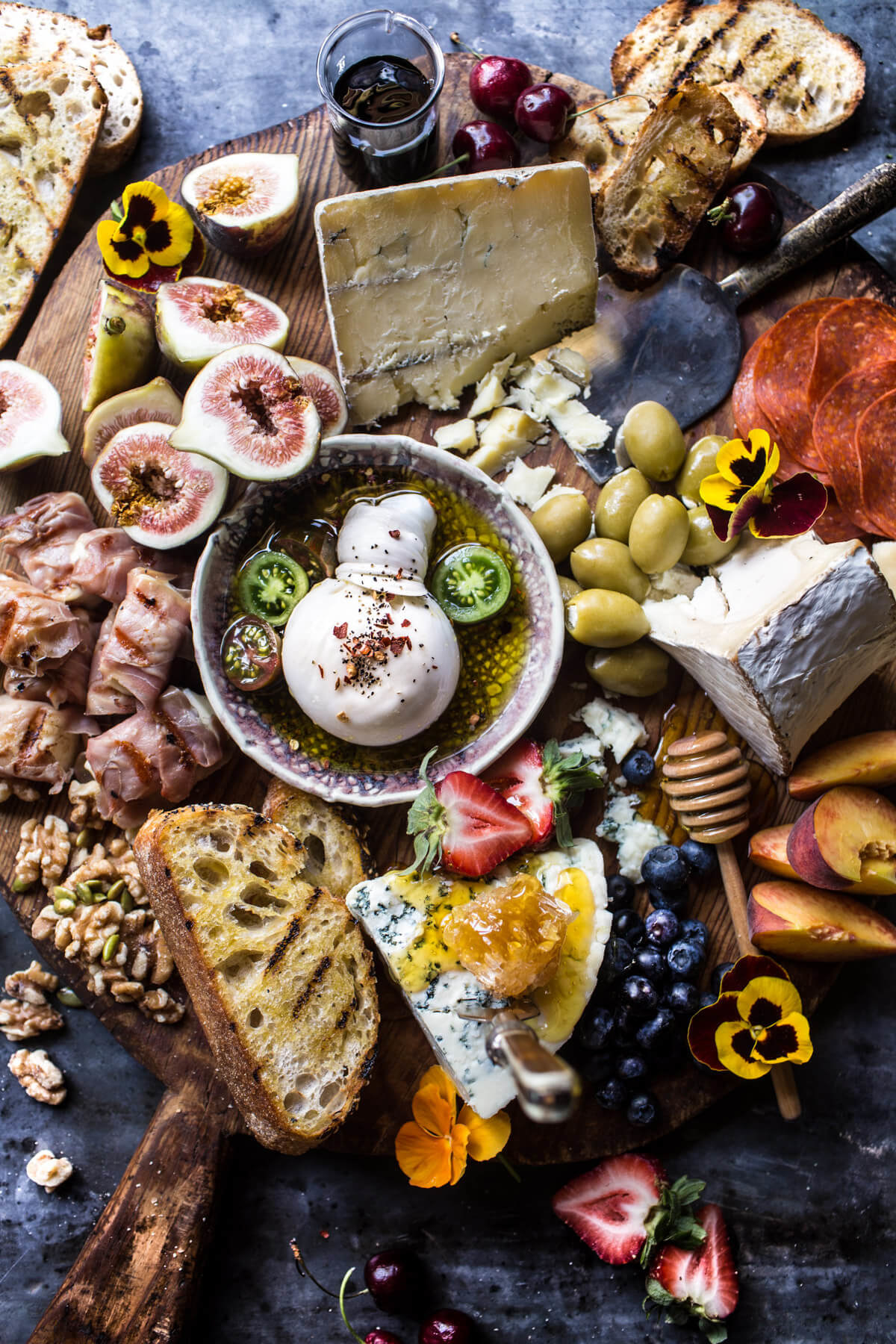 I know what you're thinking, this “simple” cheese board is basic AF. I’d prefer my store bought dip, stale crackers and rubber cheddar anyday. If you had a enough brain power to read this paragraph and had not stare longingly at this platter of dreams, I AM KIDDING! Just thank me for the recipe.