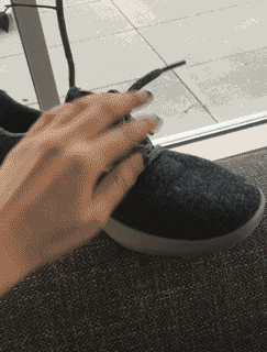 Second of all, they are so FREAKING LIGHTWEIGHT. Was the all-caps emphasis enough? No? They feel like NOTHING ON YOUR FEET. Seriously, I switched from these to my normal ankle boots and it felt like my feet were chilling in some alien, misshapen capsules. And I don't even reap the full benefits because I'm an extremely sedentary person, but even just walking around...it's incredible. You know how there's "your skin but better" in makeup speak? Well, this is "your feet but better."Also, let it be known I rarely buy new shoes because breaking them in is the work of the devil (even with deceptively comfy-looking flats...just why). But 👏 there 👏 is 👏 no 👏 breaking 👏 in with these. They're so soft (see the GIF of me squishing them) that there are no harsh edges or backing — new sneakers always give me friction burns at the back of my ankle.I haven't tossed them in the washing machine yet, but that is definitely one of the most intriguing factors/pros. You mean my shoes don't have to simmer in my gross sweat juices until I toss them? The only thing I'm iffy about is the cool/hot factor, or at least for the "warm in the cold" part; I would still wear knee-high boots because I deeply understand winter's wrath (as someone who's lived in Chicago and NYC all her life), so sneakers will just not do it. But for transitional weather like right now, I will pull them out instantly.But besides that, I actually find myself tapping my feet and doing little happy dances in these. That has never happened, OK? I understand the movie Happy Feet now. But also, someone get those penguins these shoes cause they're missing out. —Sarah HanGet a pair from Allbirds for $95. Available in three classic colors and two limited-edition colors.Allbirds sent me the shoes to try free of charge, but I wasn't obligated to positively review them.