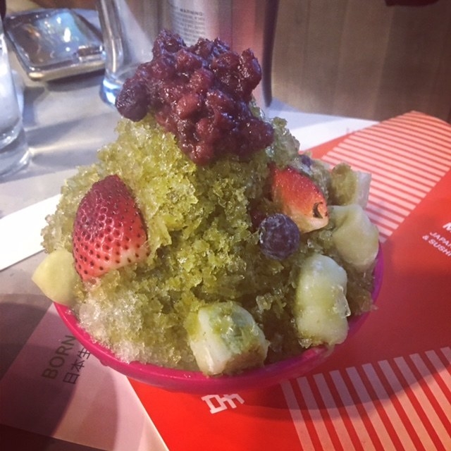 Shaved ice with matcha syrup, adzuki sweet red beans, mochi, condensed milk, strawberries, blueberries, and vanilla ice cream. The most refreshing dessert ever!