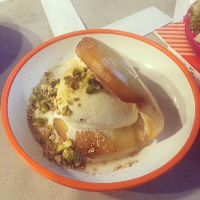 Deep fried bao stuffed with vanilla ice cream, miso caramel sauce, pistachio, and soybean powder.