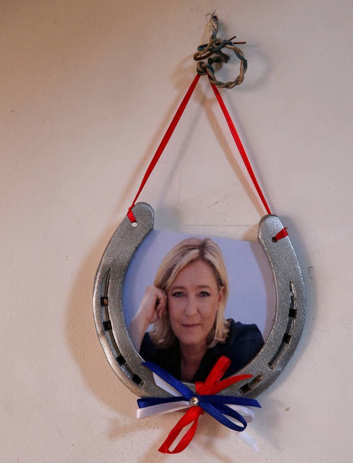 Le Pen took over as leader of the National Front in 2011 from her father Jean-Marie Le Pen, who founded the party in 1972. She's successfully worked to bring the once-fringe National Front into the mainstream, playing up her femininity to temper its racist image and publicly distancing herself from some of her father's more extreme positions (she kicked him out of the party in 2015 for denying the Holocaust). Her campaign stresses the downsides of globalization and the need for a strong national identity. BuzzFeed News spent a night with the French far-right on the sidelines of a Le Pen campaign event in Lyon in February, where jokes about gas chambers, Nazi salutes, and high-level figures in Le Pen's circle were all in the mix.