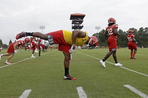 Your first college camp is going to mentally stressful. You will be around a bunch of guys who have amazing talent. There are going to be guys who are big fast and strong and at times you may wonder will you be able to compete in this league. The one thing you can tell your self is that all these guys have been freshmen before. When they first came to college they experienced the same thing you experienced. On top of that you will have coaches yelling at you telling you things like "This ain't high school no more" and "Welcome to college football".