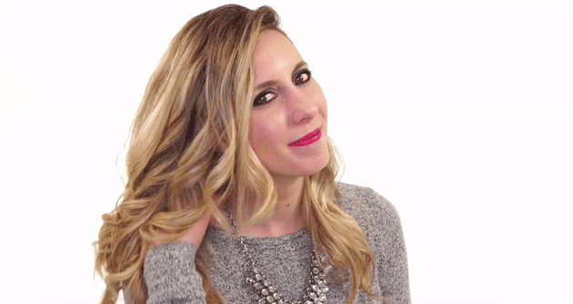 Yeah, sometimes it's a pain to get your hair to lay differently than how you usually part it, but fear not — this tutorial has you and your gorgeous, romantic curls covered.