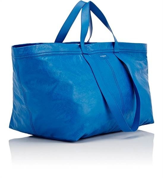 Anyway, apparently the folks over at Balenciaga recently watched that movie and said "Hey! That's some inspired stuff!" because the fashion house just debuted a tote that is, quite literally, a fancy version of a cheapo Ikea bag.