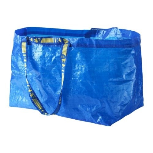 As a little refresher, here's the humble, 99 cent Ikea FRAKTA bag, last seen huddled in a laundromat or filled with junk in your garage.