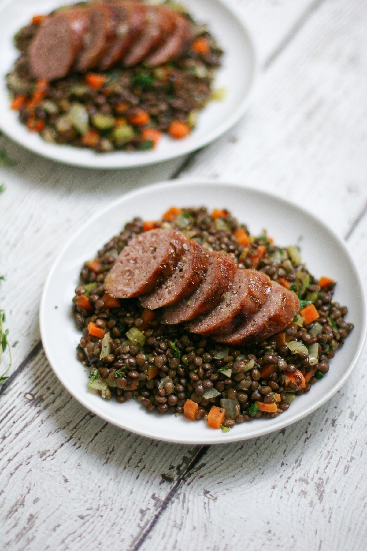 Fulfill your craving for sausage with this bratwurst recipe braised in beer and served over lentils. Get the recipe HERE