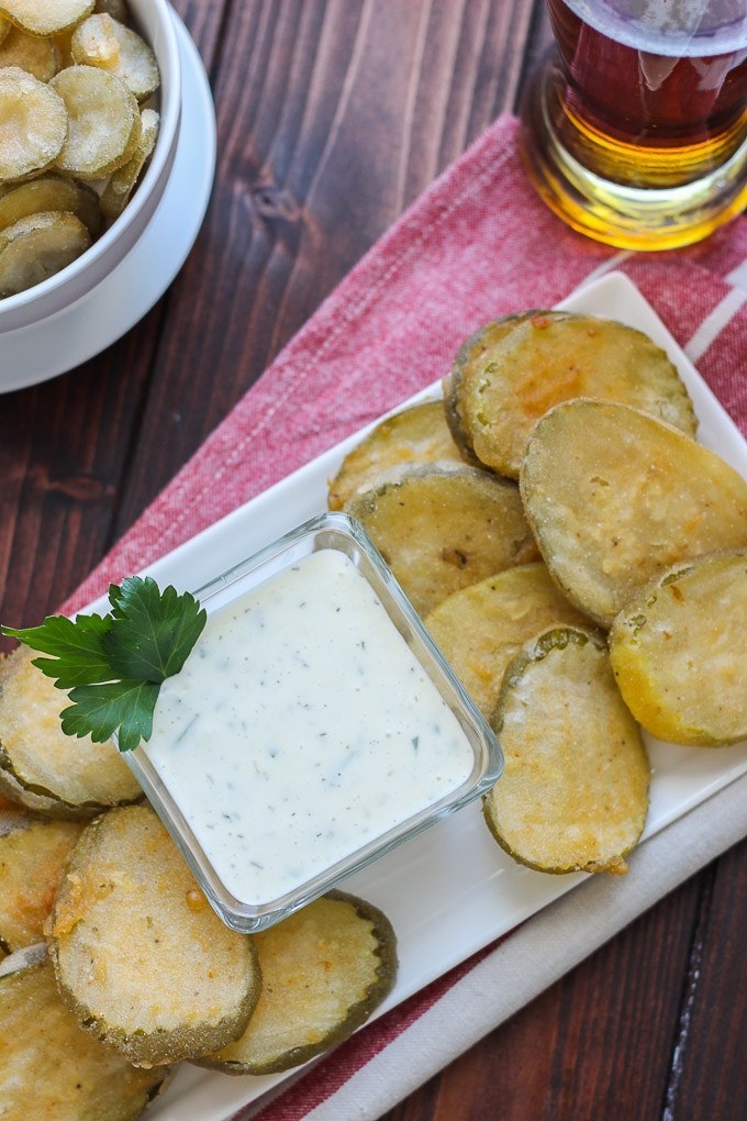 These fried beer battered pickles are perfected served with a buttermilk parsley dressing. The crunchy texture and salty pickle flavor really takes this recipe to the next level. Get the recipe HERE