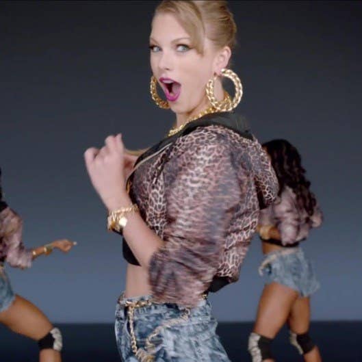 Taylor Swift isn't exactly known for her cultural consciousness, so it was no surprise when the pop star's video for 'Shake It Off' dropped. In denim booty shorts, knee pads, a cropped leopard bomber, and jumbo gold hoops, Swift tried to wine and twerk her derrière while encouraging listeners to 'shake it off,' ''Cause the players gonna play... And the haters gonna hate.' Her look was very similar to that of Salt-N-Pepa's for classic videos like 'Shoop' and 'Push It.' It’s also the look that — when worn by black girls in my retail jobs as a teen — my store managers would instruct the sales associates to closely watch. One time I actually witnessed a store manager put a sensor in her own pocket while trailing a bunch of black teens (who were dressed similarly to Swift) out the door. When the alarm went off, triggered by her planted sensor, she asked the girls if she could check their bags just as routine. She was shocked when she didn't find anything.
