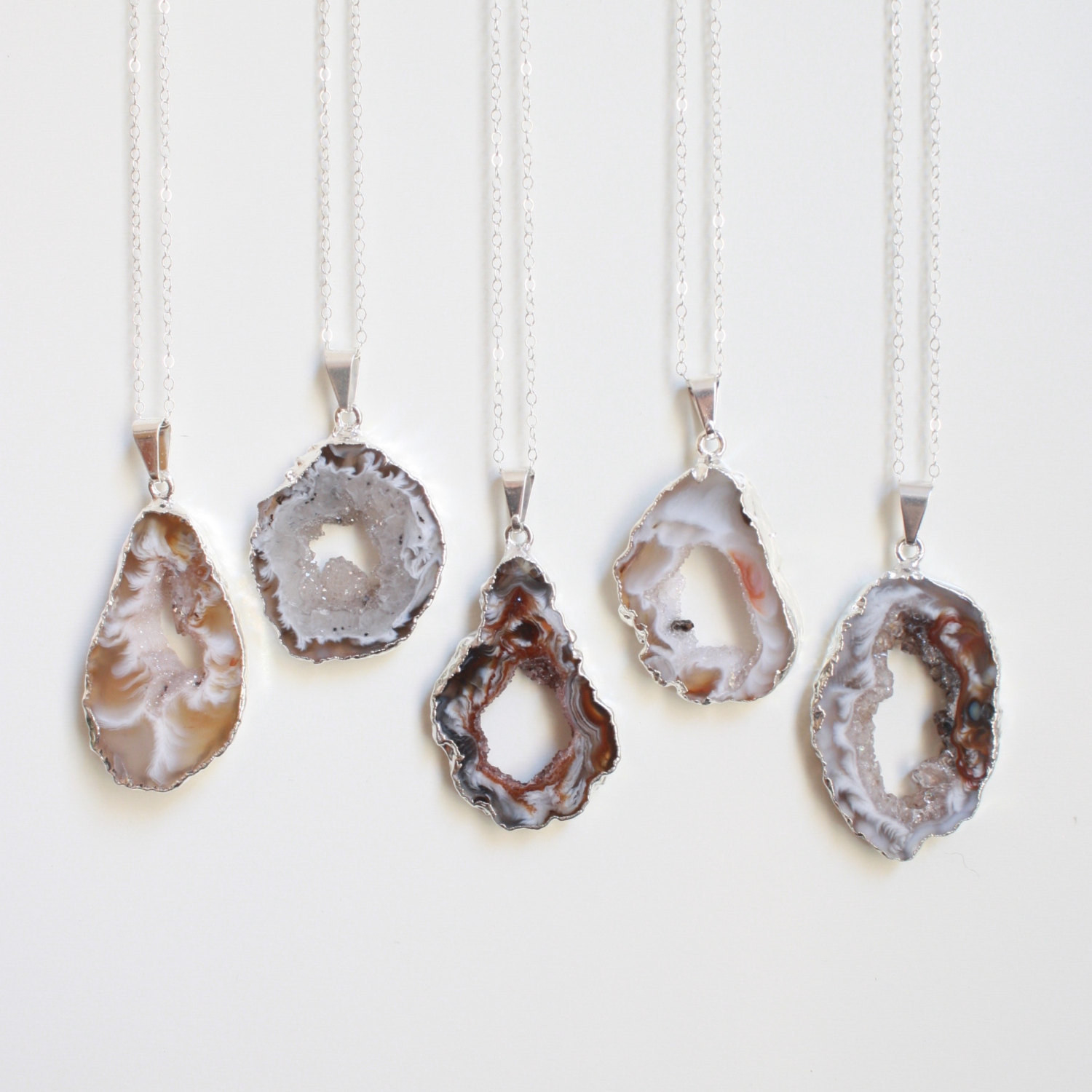 Geode necklaces filled with tiny crystals to keep you sparkling all the time.