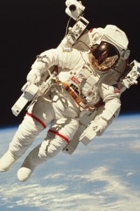 The first Internet link into low earth orbit was established on January 22, 2010 when astronaut T. J. Creamer posted the first unassisted update to his Twitter account from the International Space Station, marking the extension of the Internet into space. This personal Web access, which NASA calls the Crew Support LAN, uses the space station's high-speed Ku band microwave link. To surf the Web, astronauts can use a station laptop computer to control a desktop computer on Earth, and they can talk to their families and friends on Earth using Voice over IP equipment.
