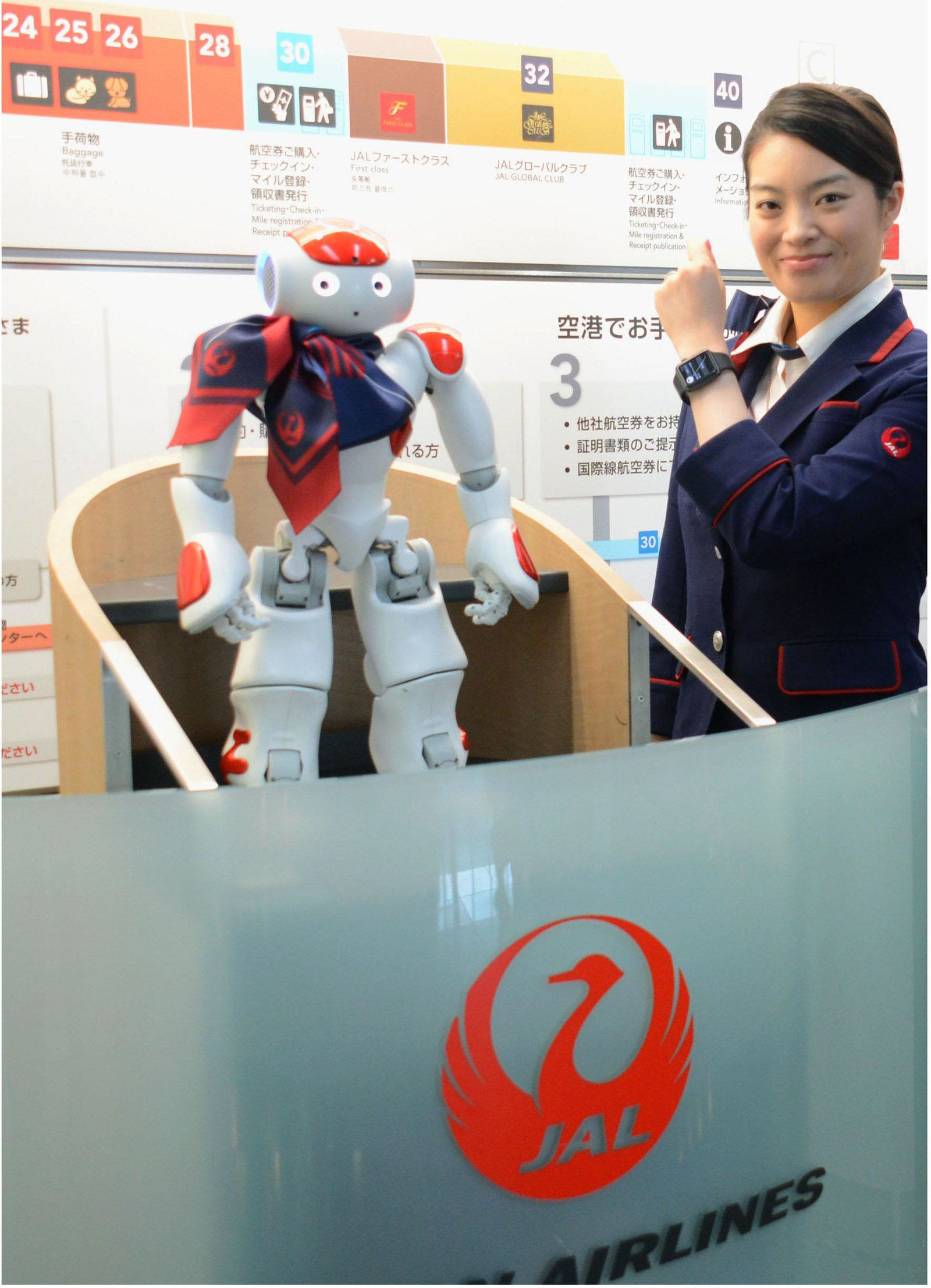 Humanoid robots guide trail by Japan Airlines Corporation. This robot name is NAO.