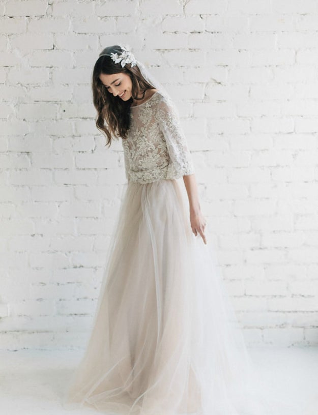 This gorgeous, bohemian two-piece dress with a French lace top and tulle skirt.