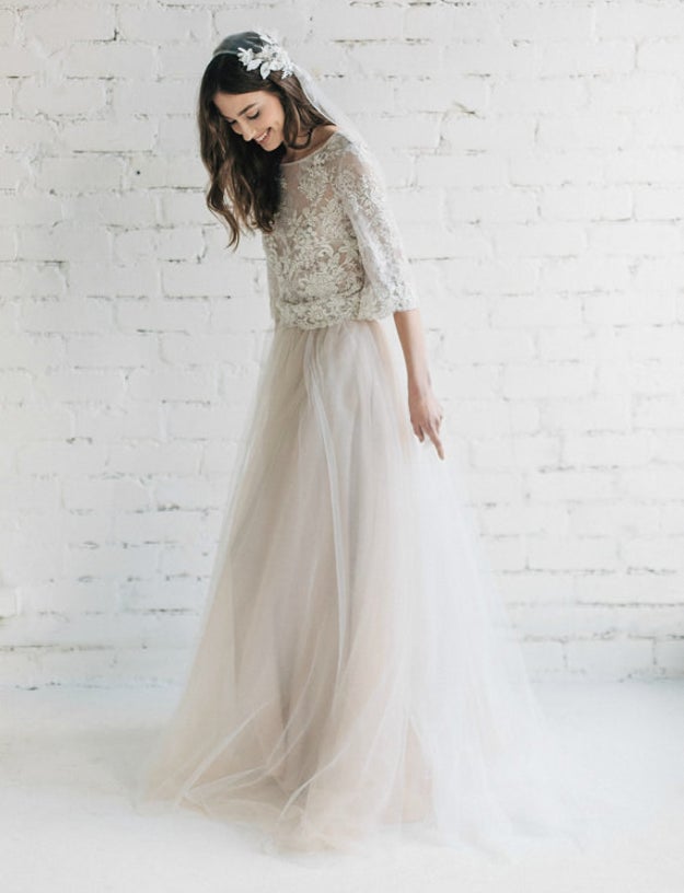 This gorgeous, bohemian two-piece dress with a French lace top and tulle skirt.