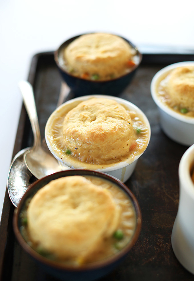These vegan pot pies feature a home made biscuit top and a mixed vegetable filling that is easy to put together. A vegan take on a classic comfort food.