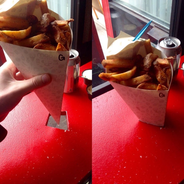 The holes in these tables so that you can support these cones of fries if you want to eat-in.