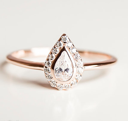 This pear-cut engagement ring is elegant and eye grabbing.