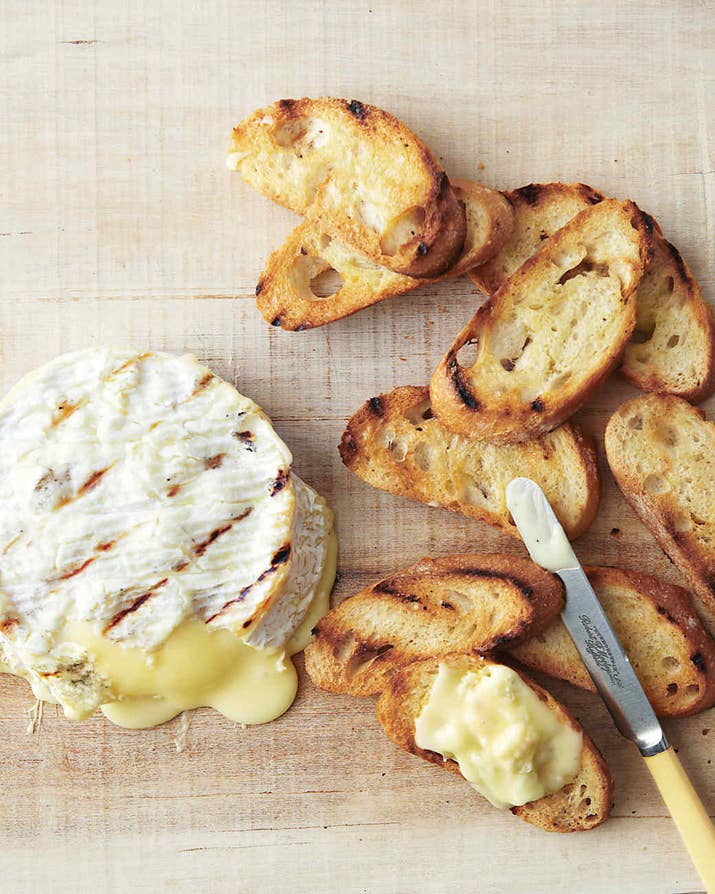Create the ultimate outdoor appetizer by grilling thick-rinned cheeses like brie and camembert that get charred and melty without falling apart. Get the recipe here.