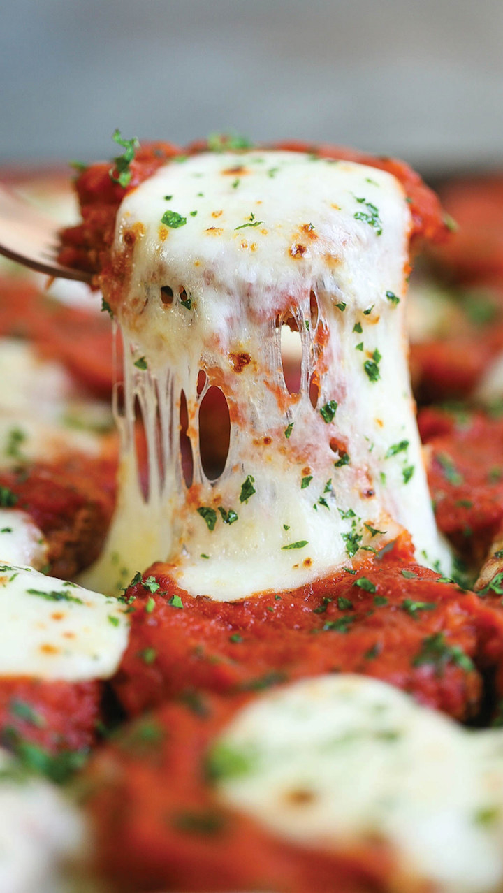 Close-up of Garlic Butter Capellini Pomodoro With Shrimp on a fork