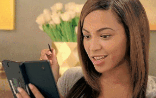 Beyoncé looking at her phone