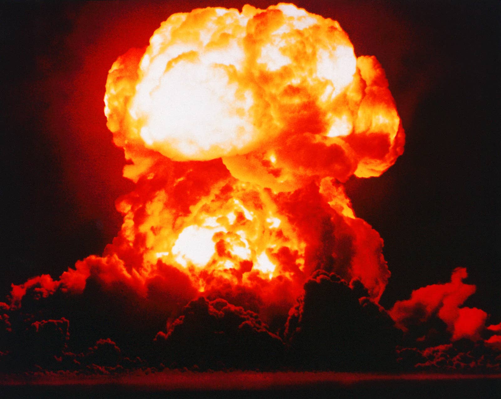 The atomic bomb nicknamed 'Smokey' is detonated in the Nevada desert as part of Operation Plumb Bob in 1957.