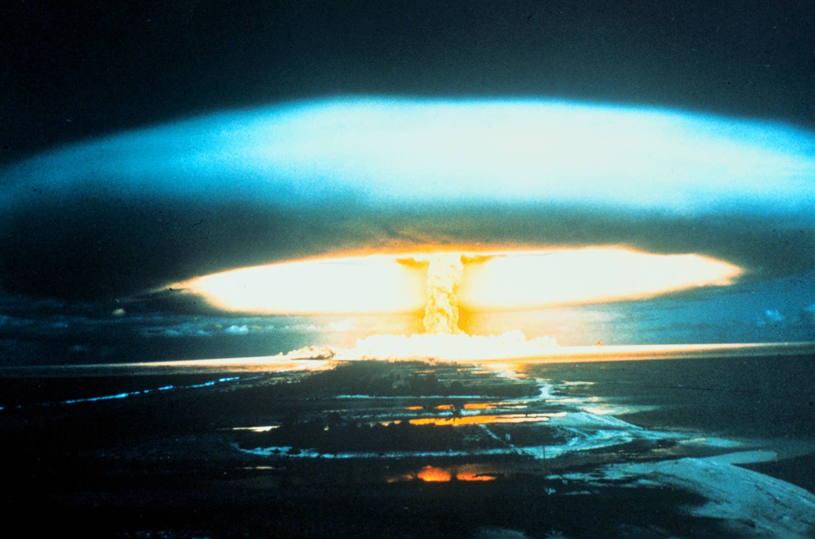 A 150-megaton thermonuclear bomb explodes over the Bikini Atoll on March 1, 1954. The unexpected spread of fallout from the test led to an increased awareness of, and research into, radioactive pollution.