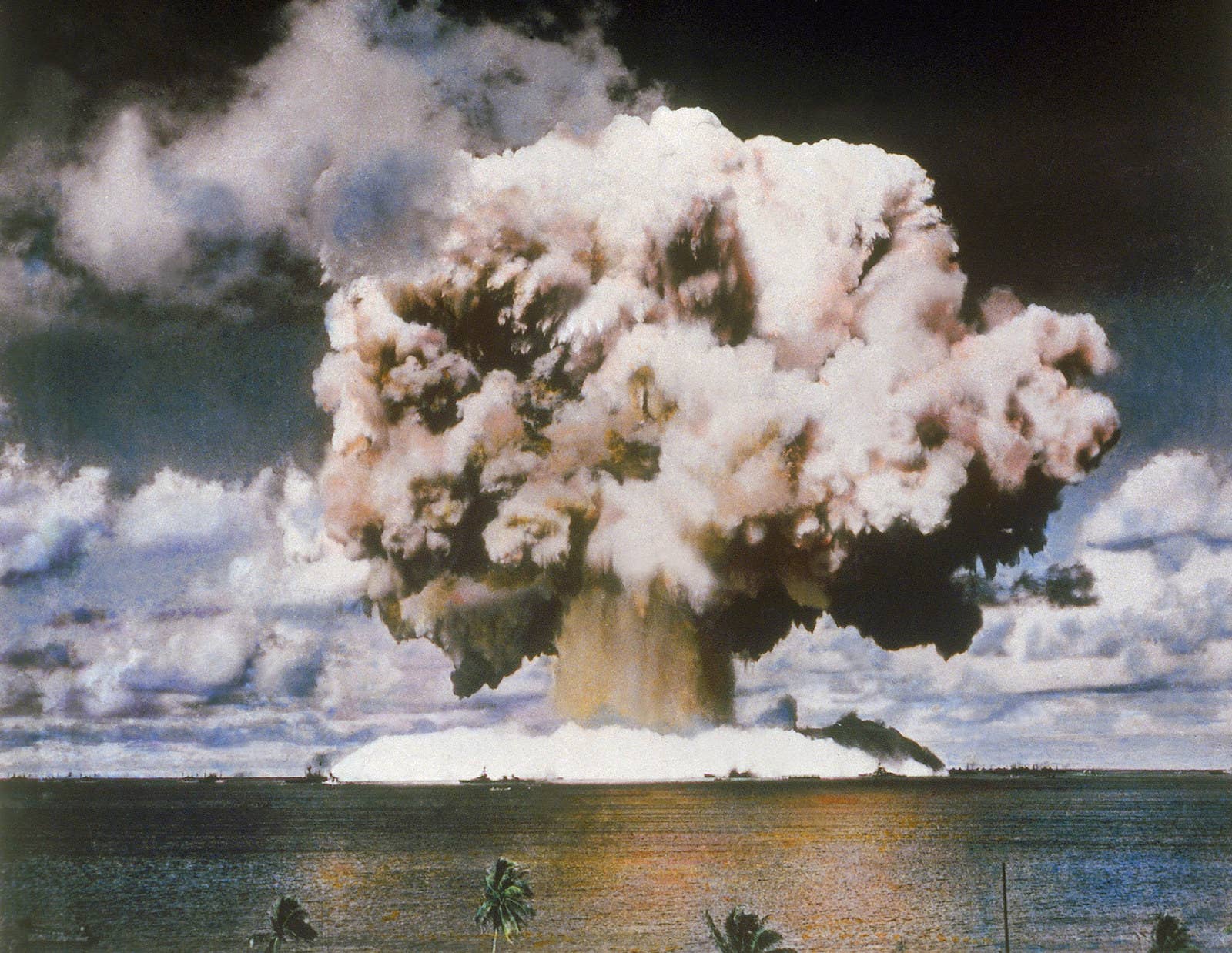 The United States tests an atomic bomb above the Bikini Atoll in the Marshall Islands in 1946.