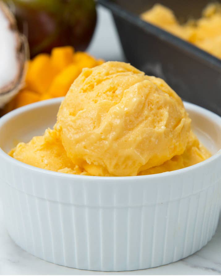 Here&#x27;s what you&#x27;ll need:* 3 cups frozen mango, diced* Â½ cup coconut milk* Â½ cup Greek yogurt* 2 tablespoon honeyHere&#x27;s what you&#x27;ll do:1.Combine ingredients into a food processor or high-speed blender.2.Pour into a pan and smooth into an even layer.3.Freeze for 2 hours, or until frozen but still a little soft for scooping. (If freezing overnight, cover with a lid or plastic wrap, but let it sit out at room temperature for about 5-10 minutes before scooping).4.Scoop into a bowl and top with your favorite toppings.5.Enjoy!