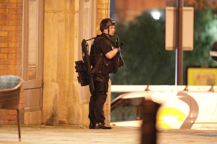 Police near the Manchester Arena after reports of an explosion.