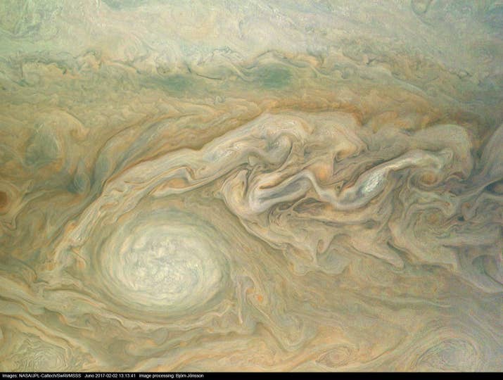 An enhanced colour view of Jupiter's clouds taken by Juno in February this year, from 14,500km above the planet's surface.