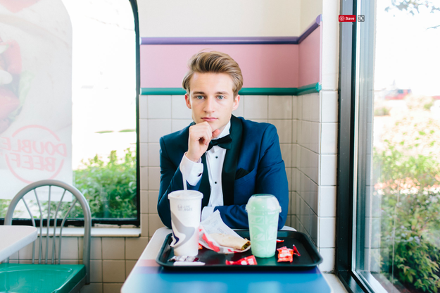 Dressed in an incongruously fancy suit, Andrew posed for a taco-themed shoot.