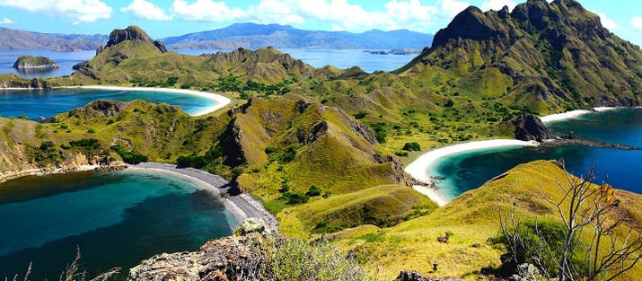 When looking for a place that offers pristine white beaches, coral reefs in all colors and turquoise waters surrounded by green hills, home to the komodo dragon, Flores is your dream destination. The surrounding almost feels like you’re in the middle of Jurassic park, and is a place fore nature lovers with plenty of mountains to climb and coral reefs to explore. From the harbor of Labuan Bajo you can take several boat trips (both day trips &amp; multiple days) to explore over a 100 (deserted) islands. As the name Komodo already suggests its the only place in the world where you can still witness the magnificent komodo dragon.