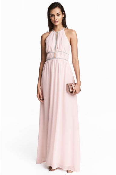 H&M steps up their game with this beautiful halter dress with metallic beading around the neck and waist lines. Crepe weave gives the look of an expensive fabric without the cost.