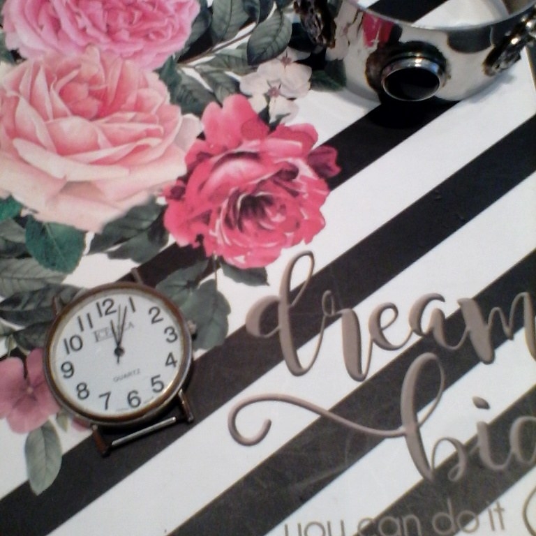 My writing journal and my watch...