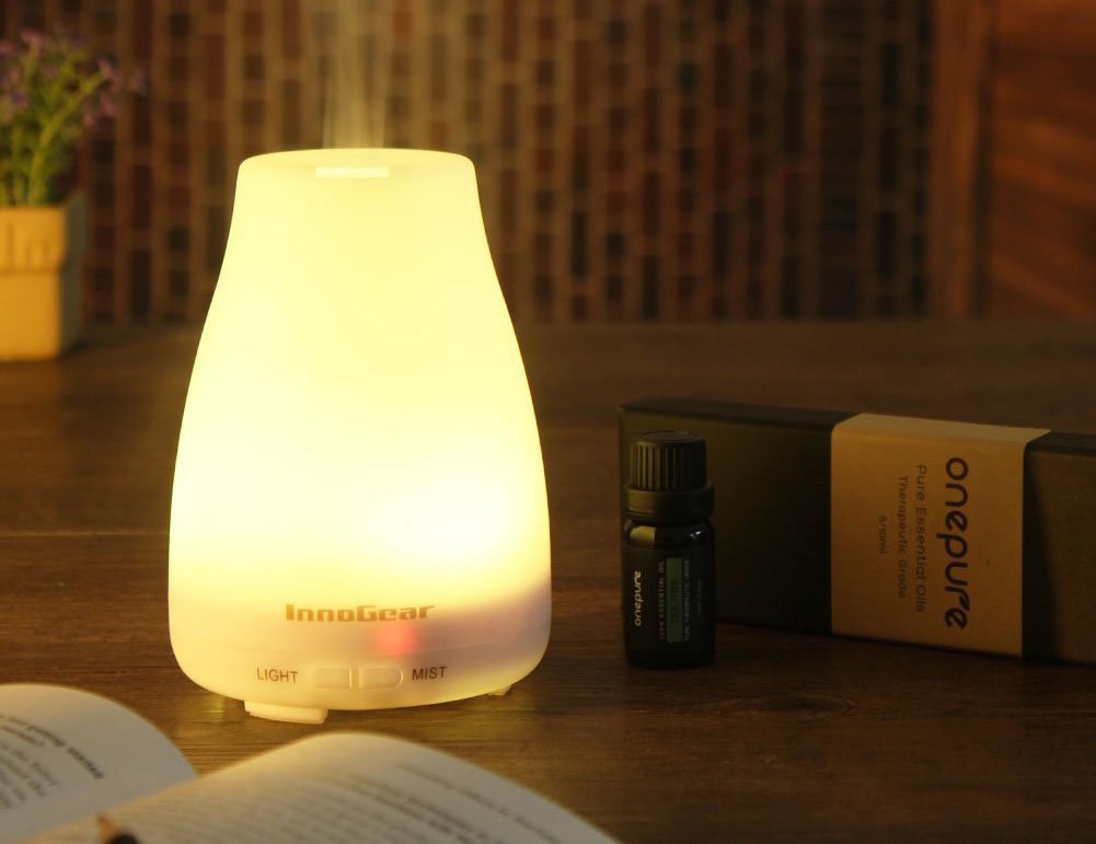 The essential oil diffuser in white, lit up