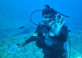 He probably took off his goggles so he can wipe off tears of joy.