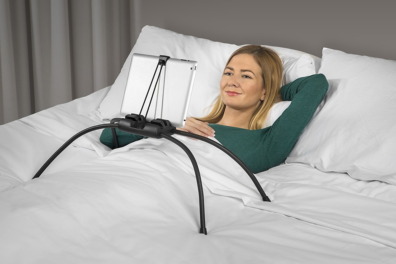 Promising Review: "This is THE way to read your iPad in bed. Or watch videos. Or write business letters. Or whatever you do with your iPad in bed, so long as it doesn't involve a lot of moving around." —The Compari-ShopperGet it from Amazon for $39.35.