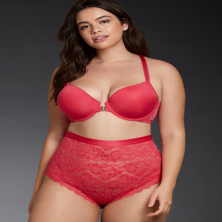 a model wearing a red bra and lacy high-waisted panties
