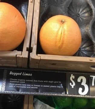 An orange with a line down one side