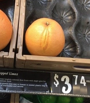 An orange with a line down one side