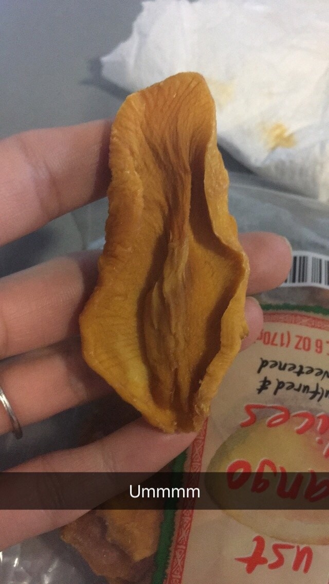 Dried mango fruit with the edges curled up