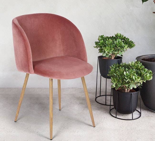 Promising Review: “This chair is great quality. I purchased the gray one, and it's exactly like the photos. The velvet is very soft and in great condition. The seat’s height is good if you want to fit it under a desk or table. Plus, the chair is actually pretty deep, so taller people should also be fine sitting in it. The assembly was also very simple!” —Amazon Customer Get it from Amazon for $91.99+ (available in six colors).And check out our full list of the best chairs you can buy on Amazon here.