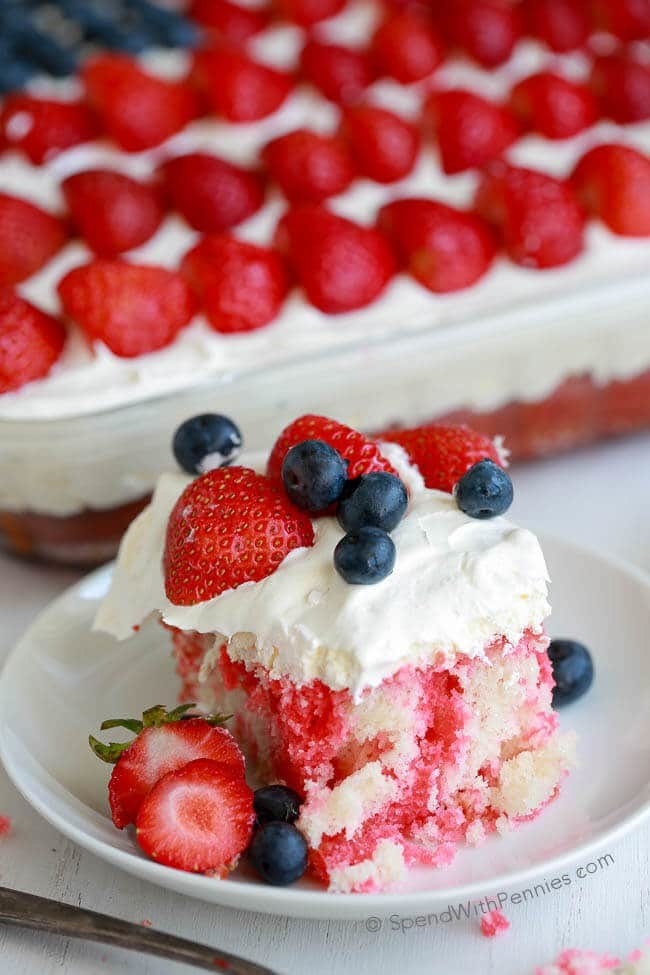 cake with berries and cream cheese frosting